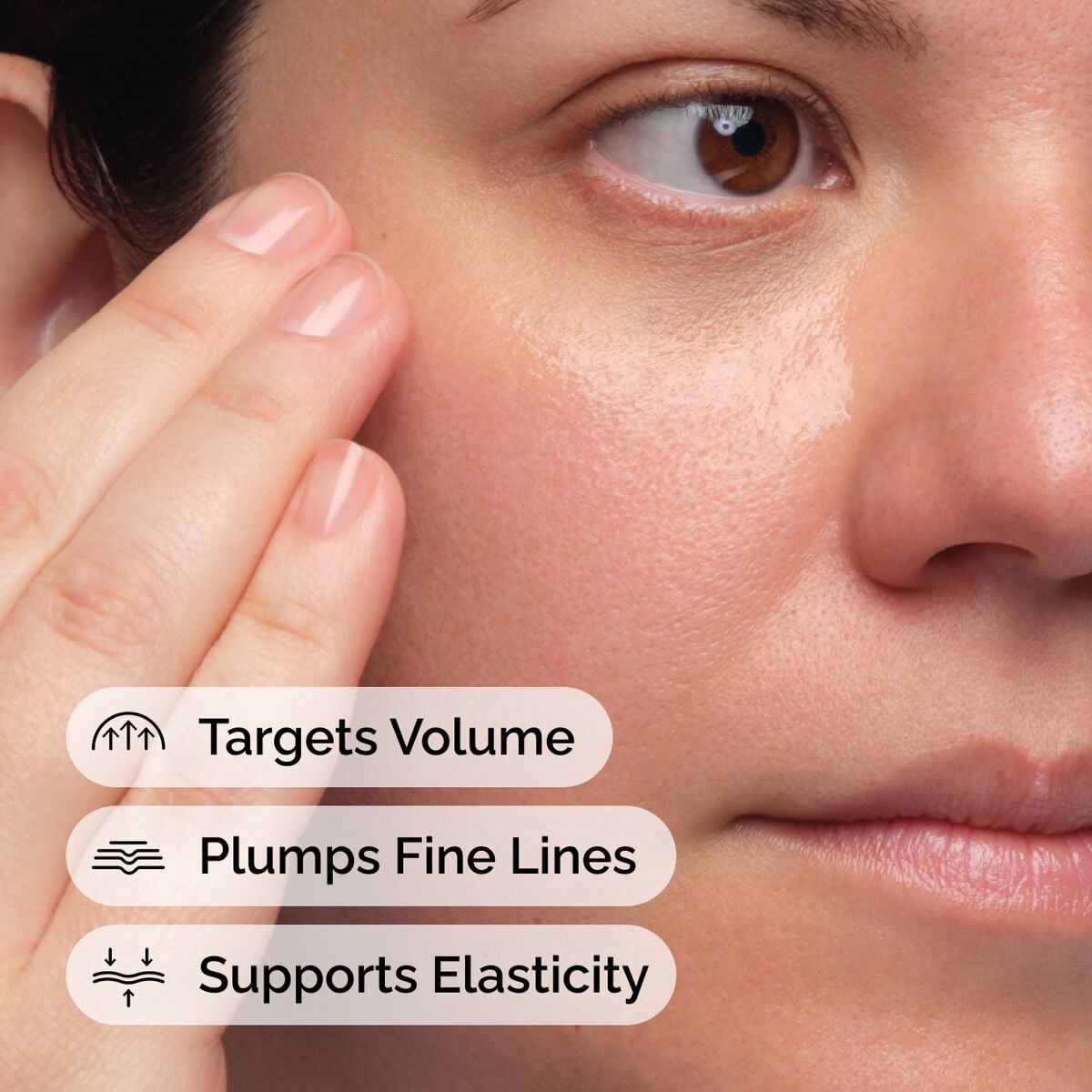 Close-up of a person gently touching their hydrated cheek, illustrating skin benefits. Text overlays: Targets Volume, Plumps Fine Lines, Supports Elasticity, all relevant to The Ordinary Volufiline 92 parts per hundred + Pal-Isoleucine 1 parts per hundred serum.